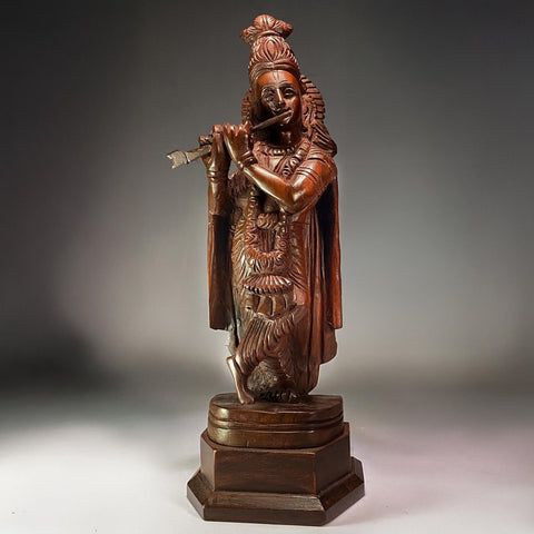 rose wood krishna statue