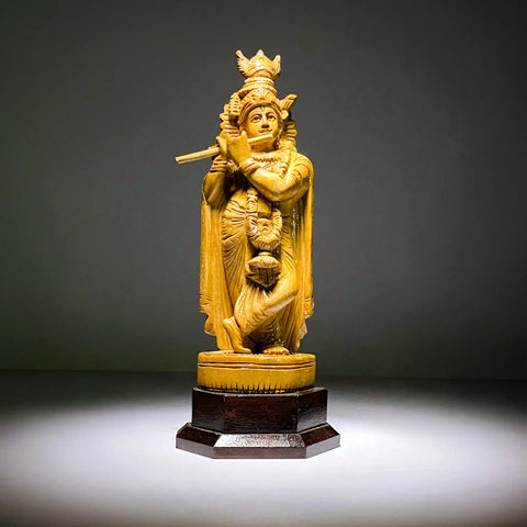 wooden krishna idol