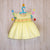smocked baby frocks yellow color