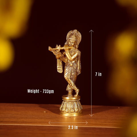 brass krishna idol