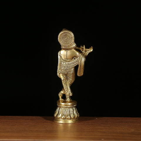 brass krishna statue
