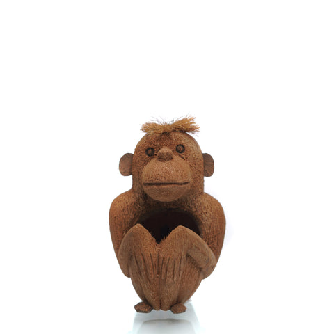 coconut husk monkey carving with open hands image