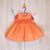 smocked baby frocks orange color