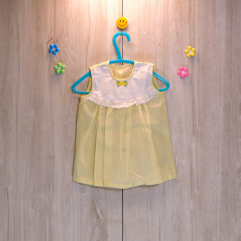 smocked yoke yellow baby dresses