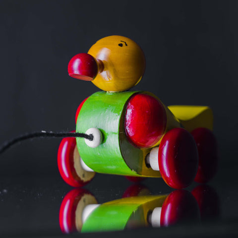 wooden 4 wheel duck toy