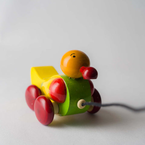 wooden duck 4 wheel pull along toy