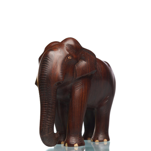 Medium sized elephant  figurine made of rosewood